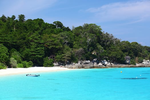 Clear water and white sandy beach at Koh Miang (Island #4) of Similan Islands in Similan National Park. Phang Nga, Thailand