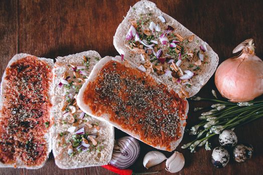 Vegetarian pizza bread, an easy snack idea to make at home during quarantine and self isolation due to covid-19 pandemic that shows the new normal lifestyle