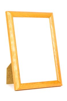 Standing wooden picture frame isolated on white background with clipping path