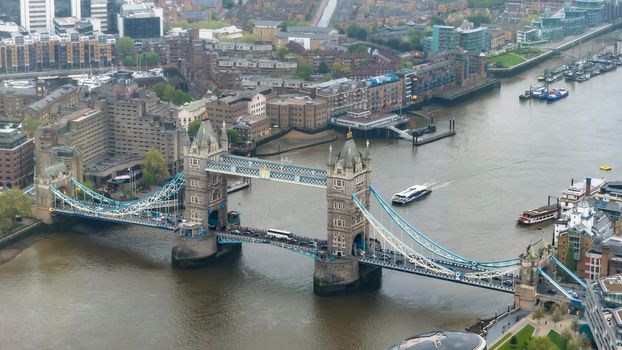 Aerial view of Tower Bridge in London at an overcast day