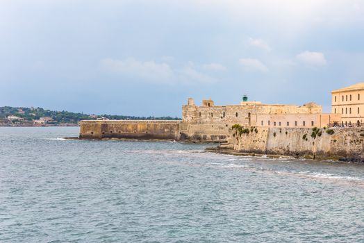 Waterfront with Maniace Castle on Ortygia Island in Syracuse, Sicily, Italy
