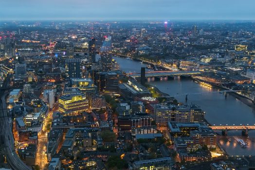 Aerial view of Southwark district in London on a cloudy day at dusk
