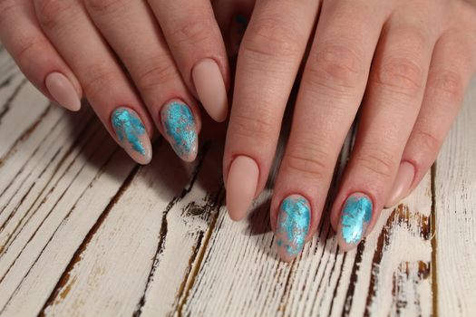 Christmas design manicure with snowflakes at the end of the nails.