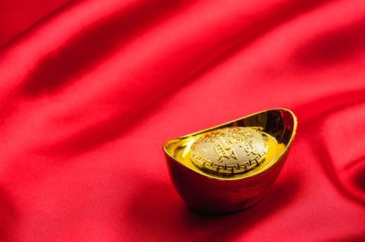 chinese gold ingot, chinese gold nugget. Chinese new year decoration concept.