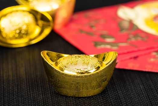 chinese gold ingot, chinese gold nugget. Chinese new year decoration concept.