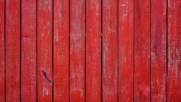 Red wooden plank wall texture background.