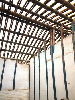 A traditional Chinese farmhouse made from bamboo poles and mud walls without nails