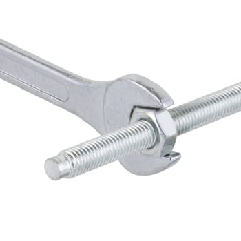 An open ended spanner wrench with nut and bolt