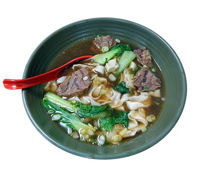 Braised beef in broth with noodles and chives is a traditional dish in Taiwan