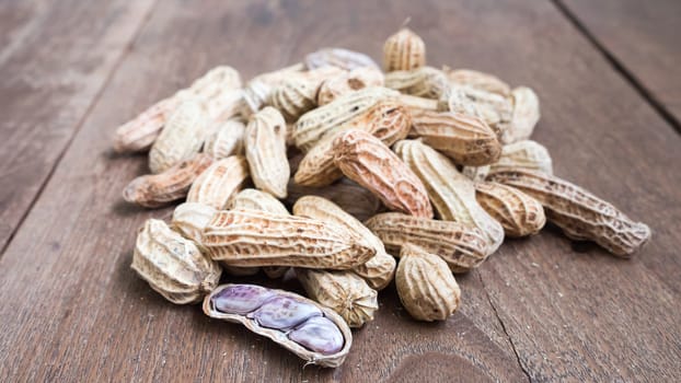 Boiled Peanuts on wooden table background.Selective focus