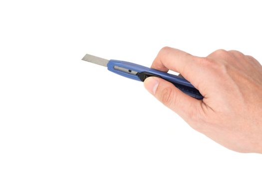 Hand holding cutter knife on white background.