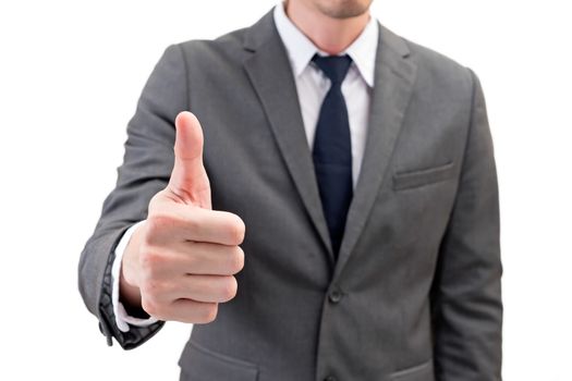 Businessman showing thumbs up isolated on white background.