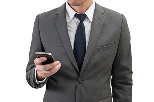 Businessman holding mobile phone  isolated on white background.