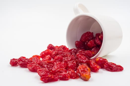 Dried Tomatoes with cup  on white backgrund.