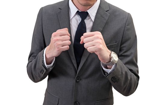 businessman holding his fists in front of him isolated on white background. business struggle