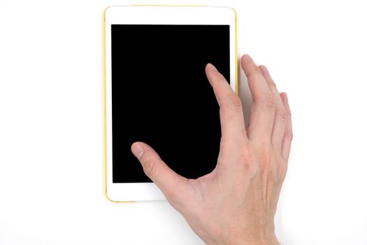 Male hand with a white tablet touch computer gadget with touch blank black screen on white background.