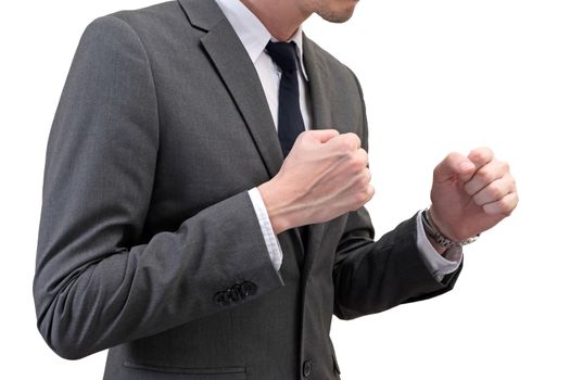 businessman holding his fists in front of him isolated on white background. business struggle