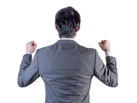 backview of businessman standing with hands up.