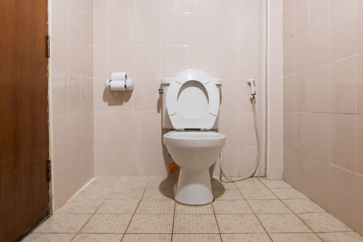 toilet bowl in a bathroom.