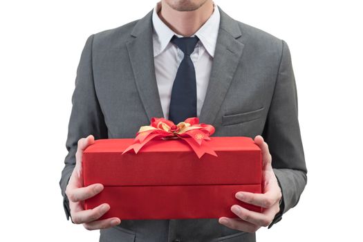 Businessman holding a red giftbox  isolated on white background.