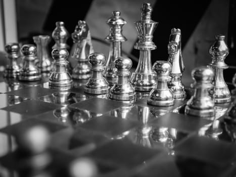 Chess pieces with chess board.Selective focus.black and white filter.