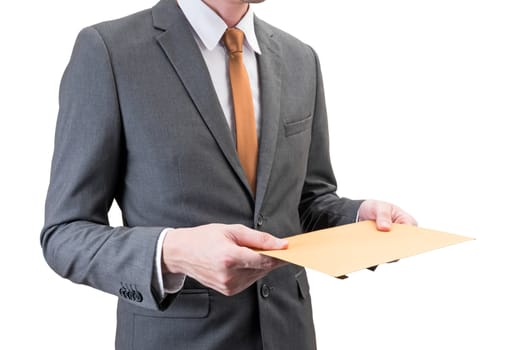 Businessman holding an envelope  isolated on white background.