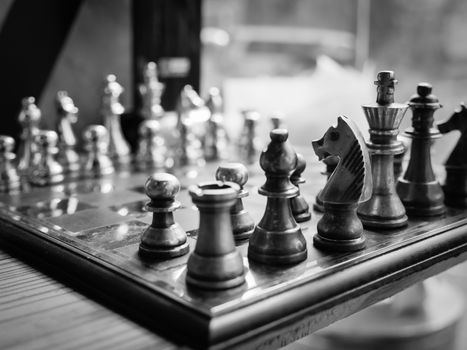 Chess pieces with chess board.Selective focus.black and white filter.