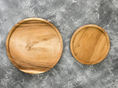 Top view of empty wooden tray on grunge  background.