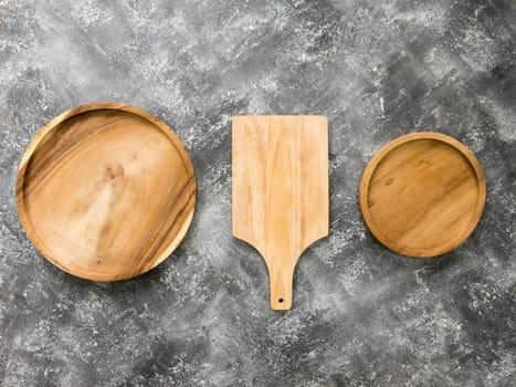 Top view of empty wooden tray on grunge  background.
