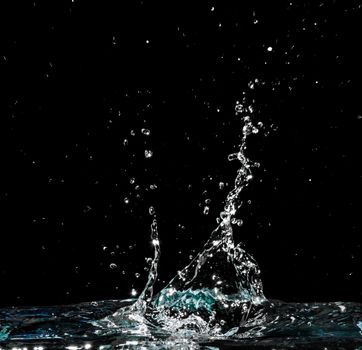 Water splash isolated on black background