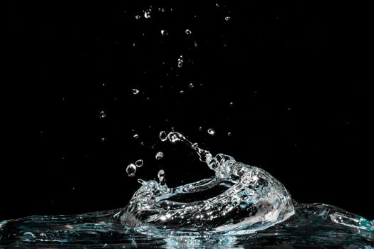 Water splash isolated on black background
