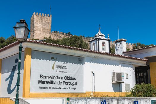 Obidos, Portugal - April 12, 2019: View of the tourist information point at the entrance to the historic city on a spring day