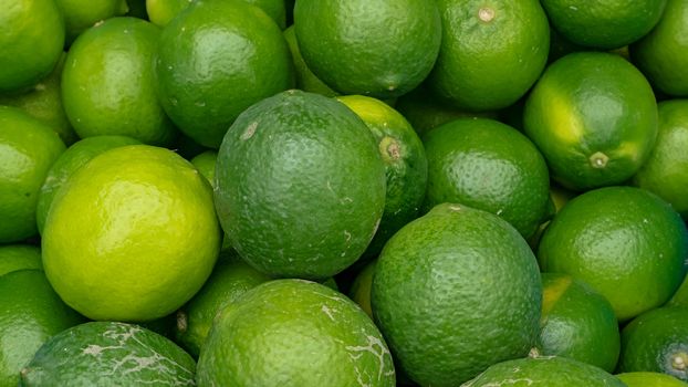 The close up of fresh organic green lime at food market in Taipei, Taiwan.