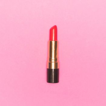 Lipstick on pink background.  Makeup and Beauty concept