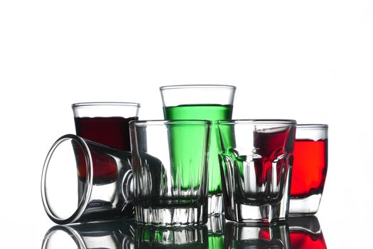 Collage of glasses with cocktail on a white background.