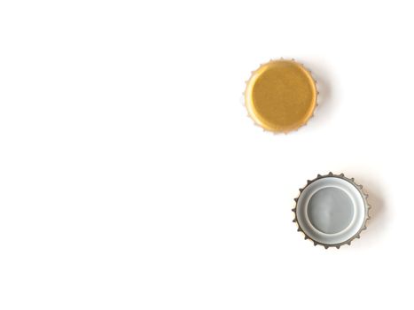 Bottle caps on a white background, Free space for text.