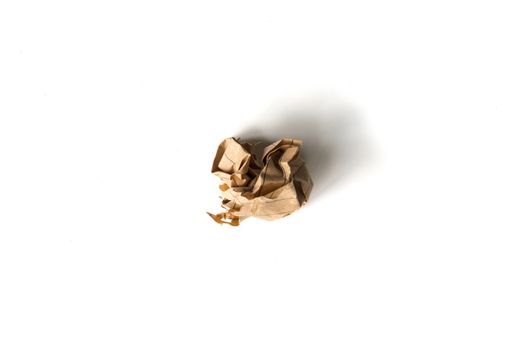 Crumpled paper ball on a white background.