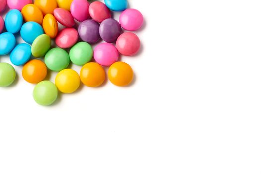 Colorful candies on a white background, Free space for text.