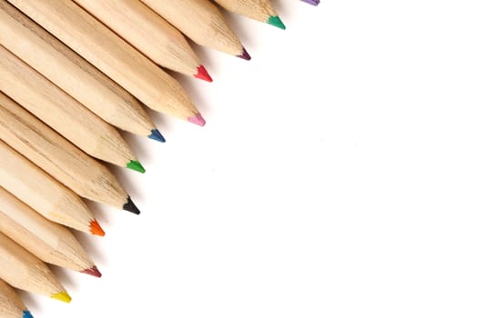 Color pencils on white background. Free space for text