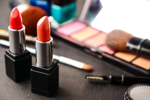 Cosmetics set for makeup on the table. Selective focus