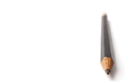 Tip of a pencil on a white background, Free space for text.