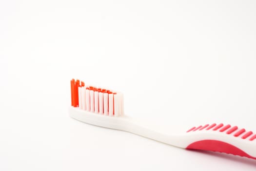 Close up of Toothbrush on a white background.