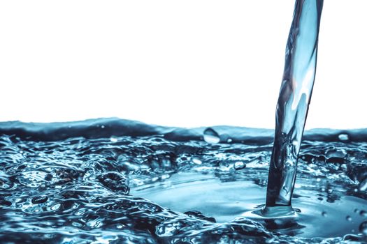 Close up of Pouring water on water surface background.