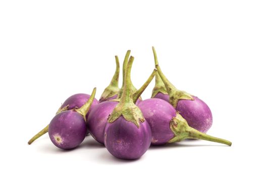 Fresh Purple eggplants on white background.