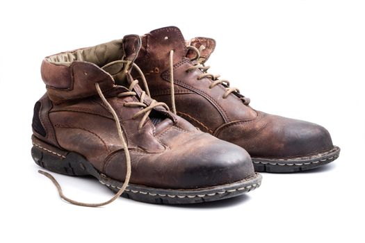 Men's brown leather shoes on white background.