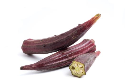 Fresh Red okra on white background.