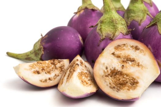 Fresh Purple eggplants on white background.