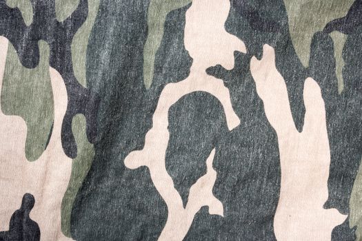 Camouflage fabric texture pattern background.