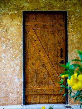 New brown modern wooden door lock in house interior