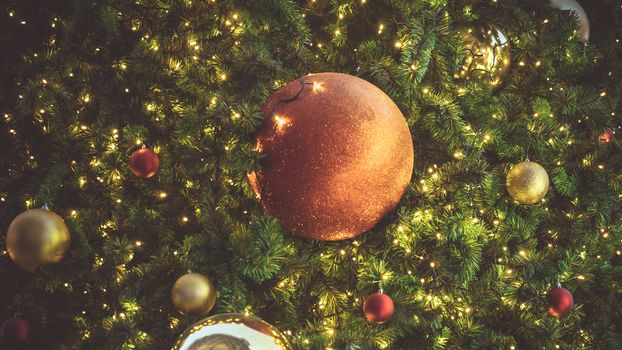 Christmas decorations on the branches fir background.